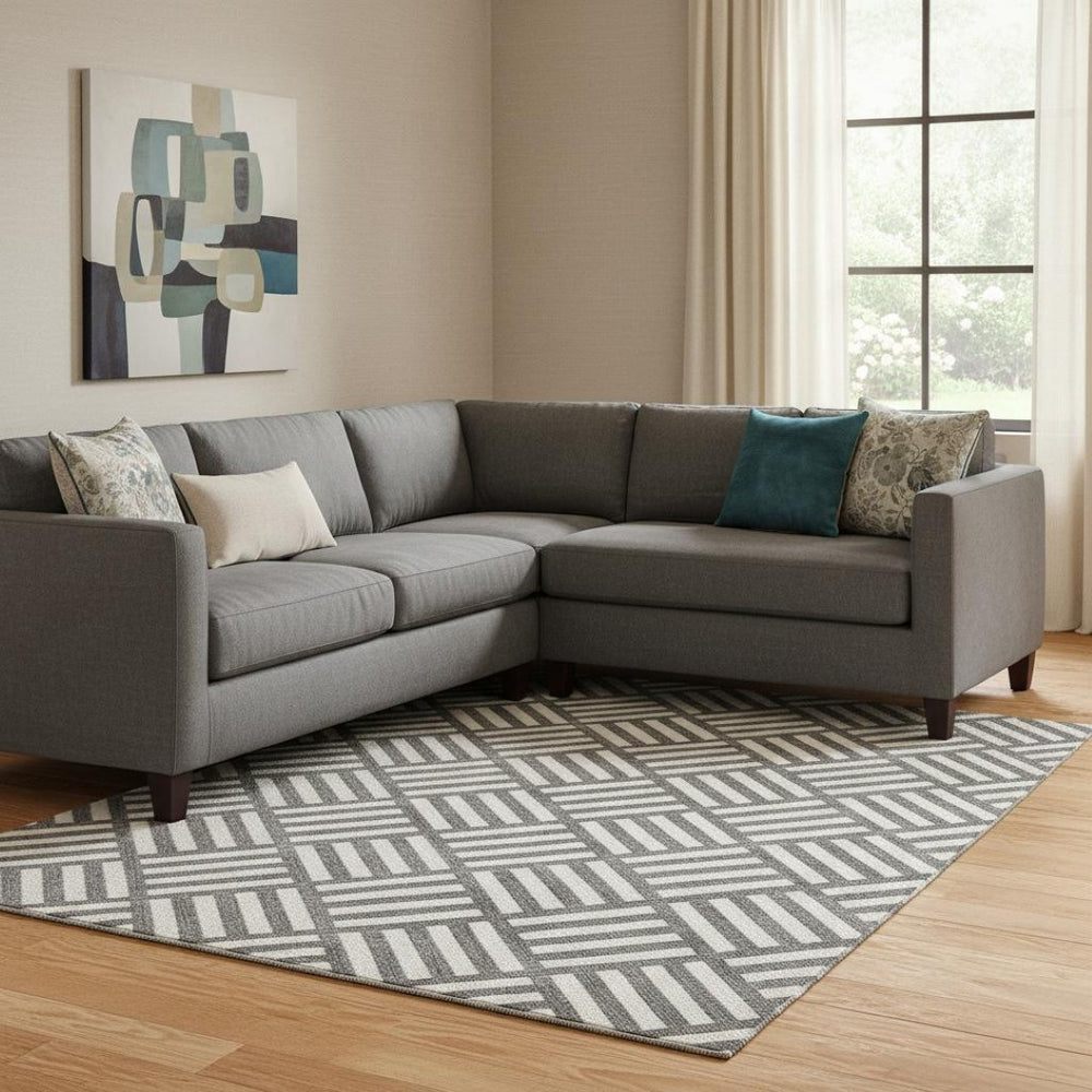 HomeRoots 10' X 14' Black And Ivory Geometric Area Rug – Stylish, Washable & UV-Protected for High-Traffic Spaces 652329