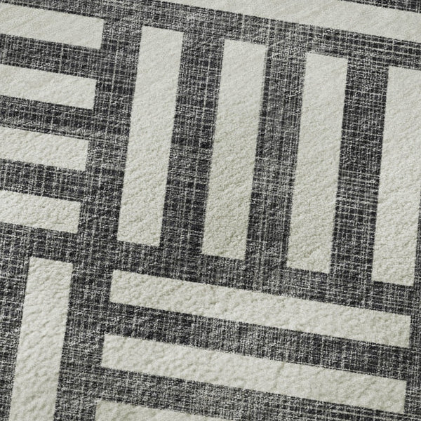 HomeRoots 10' X 14' Black And Ivory Geometric Area Rug – Stylish, Washable & UV-Protected for High-Traffic Spaces 652329