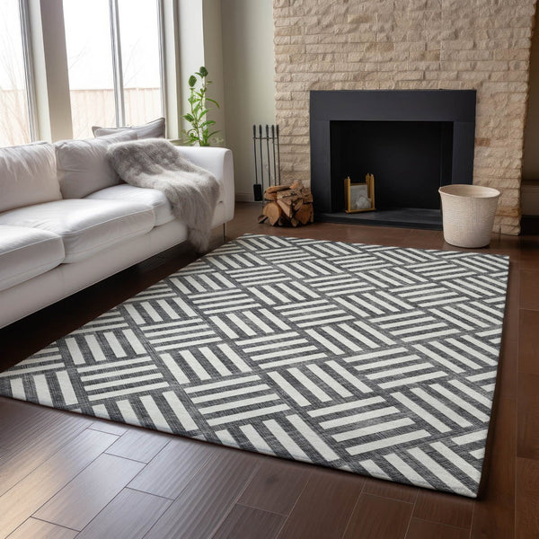 HomeRoots 10' X 14' Black And Ivory Geometric Area Rug – Stylish, Washable & UV-Protected for High-Traffic Spaces 652329
