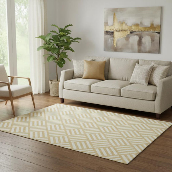 HomeRoots 5' X 8' Gold and Ivory Geometric Area Rug - Durable, Washable, UV-Protected for Modern Spaces 652355