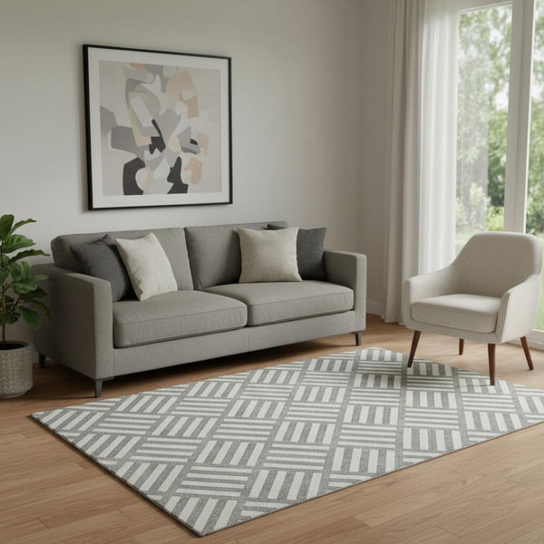 HomeRoots 5' X 8' Gray and Ivory Washable Geometric Area Rug with UV Protection for High-Traffic Spaces 652361