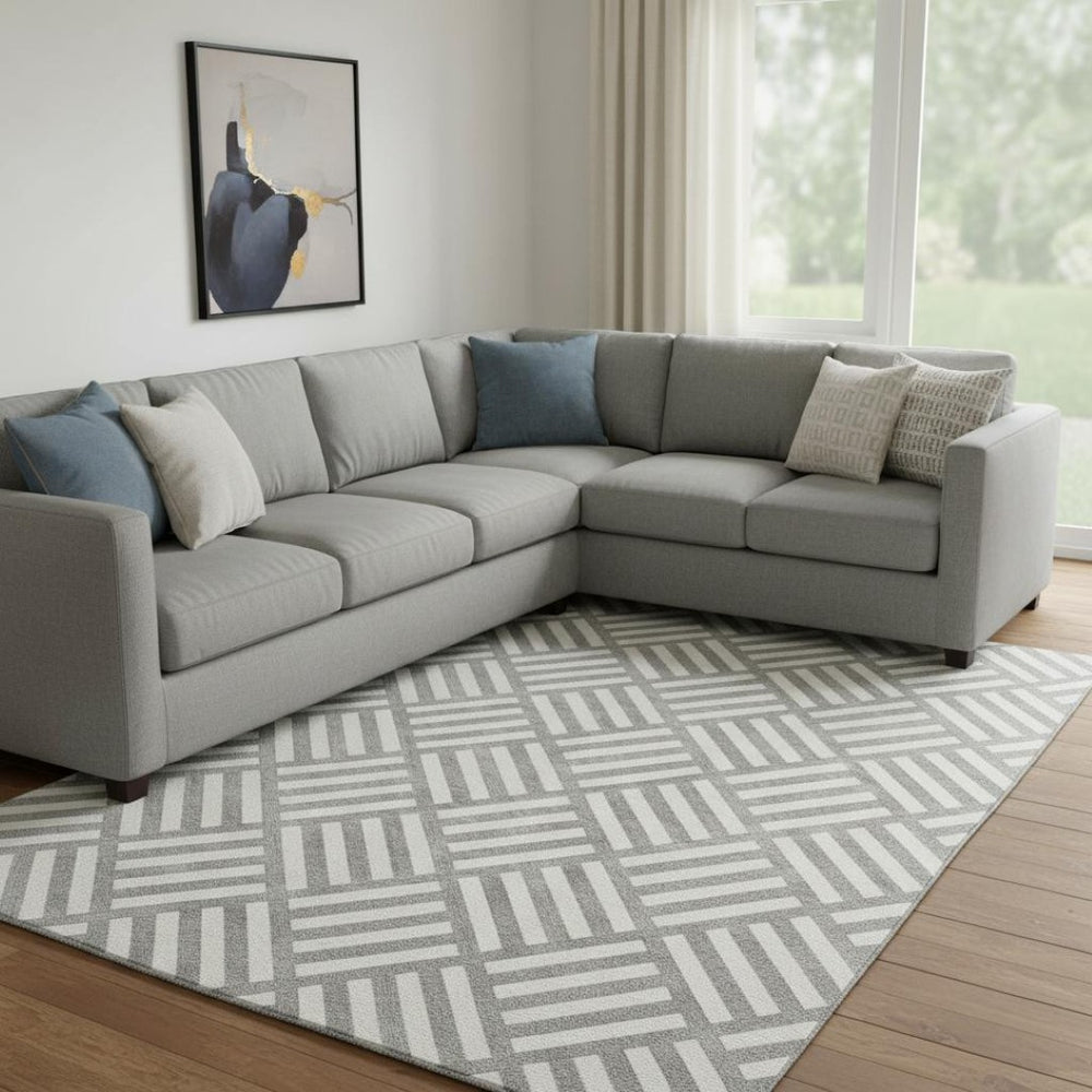 HomeRoots 10' X 14' Gray And Ivory Geometric Area Rug – Durable, Stain Resistant, and UV Protected for Modern Spaces 652365