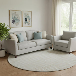 HomeRoots 8' Ivory and Beige Geometric Round Rug - Washable, UV-Protected, Perfect for Family Spaces! 652368