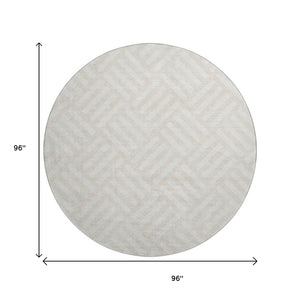 HomeRoots 8' Ivory and Beige Geometric Round Rug - Washable, UV-Protected, Perfect for Family Spaces! 652368