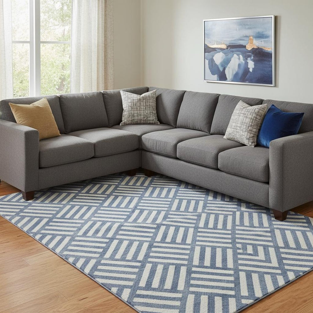 HomeRoots 9' X 12' Navy Blue Geometric Area Rug - Washable, UV Protected, Stain Resistant, Modern Design 652388