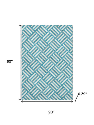 HomeRoots 5' X 8' Teal and Ivory Geometric Area Rug – Stain Resistant, UV Protected, Machine Washable Design 652433