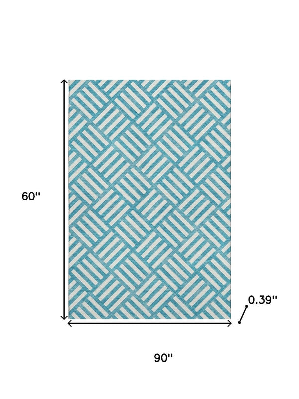 HomeRoots 5' X 8' Teal and Ivory Geometric Area Rug – Stain Resistant, UV Protected, Machine Washable Design 652433