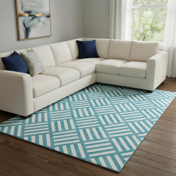 HomeRoots 10' X 14' Teal and Ivory Geometric Washable Area Rug - Durable, UV Protected, Perfect for Busy Homes! 652437