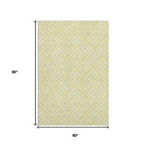 HomeRoots 5' X 8' Yellow And Ivory Geometric Area Rug - Durable, Washable, UV Protected for Family Homes 652445