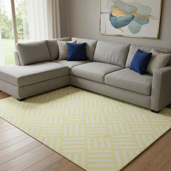 HomeRoots 8' X 10' Washable Yellow & Ivory Geometric Area Rug with UV Protection for Modern Homes & Families 652447