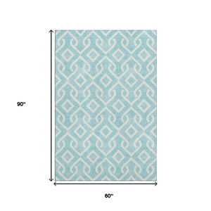 HomeRoots 5' X 8' Aqua and Ivory Geometric Washable Area Rug - Stylish, Durable, Stain-Resistant, UV Protected! 652451