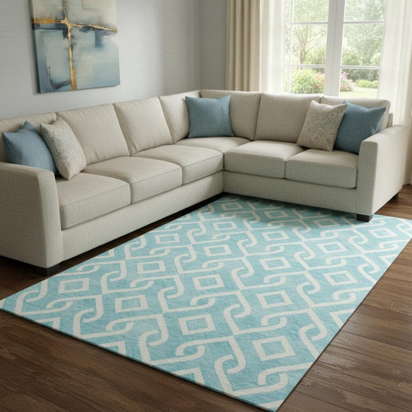 HomeRoots 10' Aqua and Ivory Geometric Area Rug - Washable, UV Protected, Stain Resistant for Busy Homes 652455