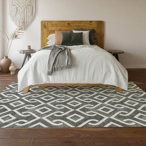HomeRoots 8' X 10' Modern Black and Ivory Geometric Area Rug – Washable, UV Protected for Everyday Living 652465
