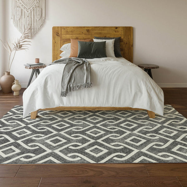 HomeRoots 8' X 10' Modern Black and Ivory Geometric Area Rug – Washable, UV Protected for Everyday Living 652465