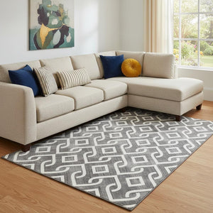 HomeRoots 8' X 10' Modern Black and Ivory Geometric Area Rug – Washable, UV Protected for Everyday Living 652465