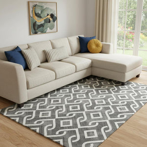 HomeRoots 10' X 14' Black And Ivory Geometric Rug - Washable, UV-Protected, Stylish for High-Traffic Areas 652467