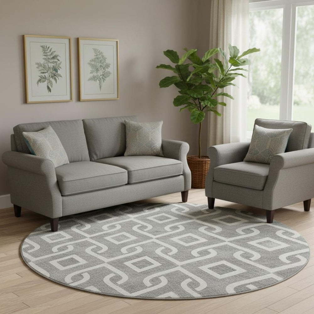 HomeRoots 8' Gray And Ivory Geometric Round Rug - Washable, UV Protected, Durable Design for Modern Living Spaces 652512
