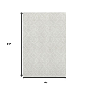 HomeRoots 5' X 8' Ivory And Beige Geometric Area Rug - Washable, UV Protected, Perfect for Busy Homes! 652517
