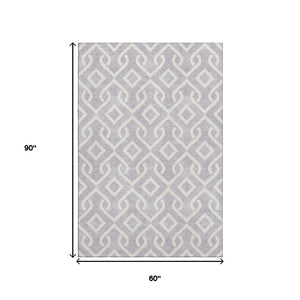 HomeRoots 5' X 8' Lavender Geometric Area Rug - Washable, UV-Protected, Soft & Stylish for Modern Homes 652523