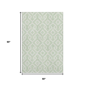 HomeRoots 5' X 8' Stylish Mint Green Geometric Area Rug - Washable, UV Protected, Perfect for Busy Homes! 652529