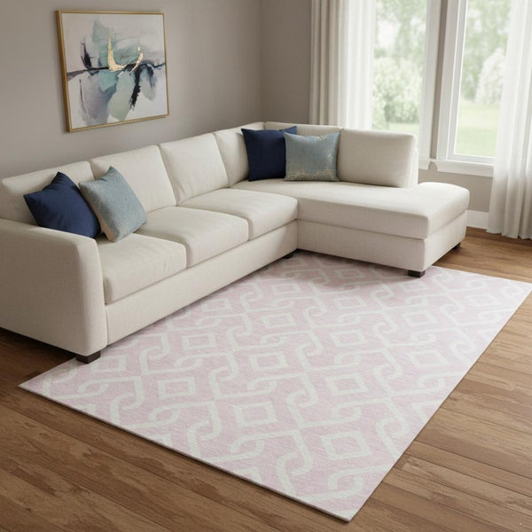 HomeRoots 8' X 10' Pink and Ivory Geometric Washable Area Rug - Stylish, UV-Protected, Easy-Care for Modern Spaces 652549