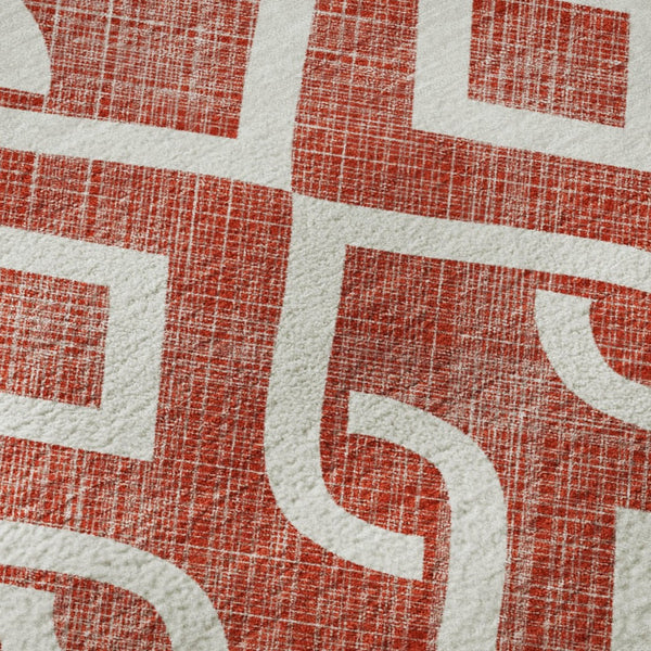 HomeRoots 5' X 8' Red And Ivory Geometric Area Rug - Washable, UV Protected, Perfect for Kids & Pets! 652565