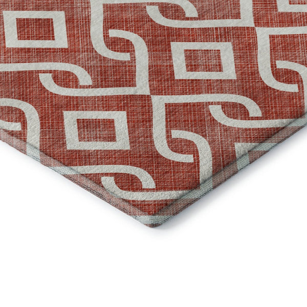 HomeRoots 8' Red and Ivory Geometric Round Rug - Washable, UV Protected, Stylish, and Family-Friendly Design! 652566