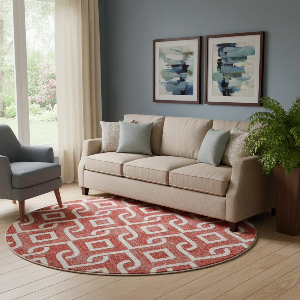HomeRoots 8' Red and Ivory Geometric Round Rug - Washable, UV Protected, Stylish, and Family-Friendly Design! 652566