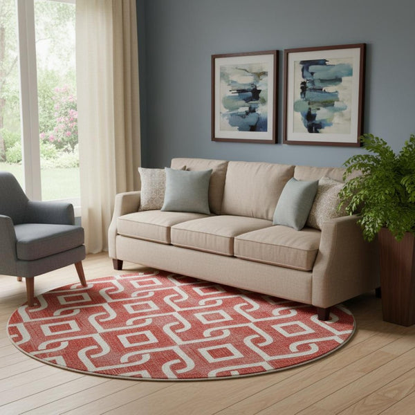 HomeRoots 8' Red and Ivory Geometric Round Rug - Washable, UV Protected, Stylish, and Family-Friendly Design! 652566