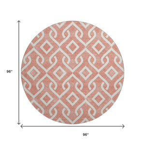 HomeRoots 8' Salmon and Ivory Geometric Round Rug - Washable, UV-Protected, Durable for High-Traffic Areas 652578
