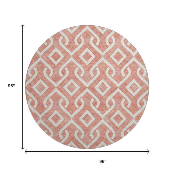 HomeRoots 8' Salmon and Ivory Geometric Round Rug - Washable, UV-Protected, Durable for High-Traffic Areas 652578