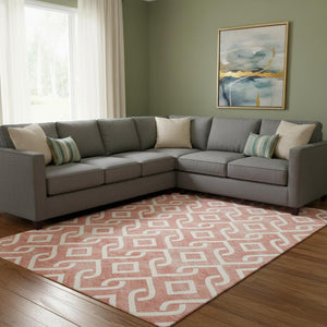 HomeRoots 8' X 10' Salmon and Ivory Geometric Area Rug - Durable, Stain-Resistant, UV Protected for Homes 652579