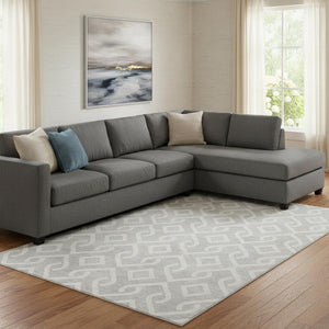 HomeRoots 10' X 14' Silver & Ivory Geometric Area Rug - Durable, Washable, UV-Protected for Modern Spaces 652587