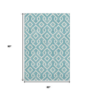 HomeRoots 5' X 8' Teal and Ivory Geometric Area Rug - Stylish, Washable, Stain-Resistant with UV Protection 652589