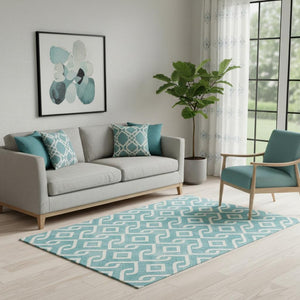 HomeRoots 5' X 8' Teal and Ivory Geometric Area Rug - Stylish, Washable, Stain-Resistant with UV Protection 652589