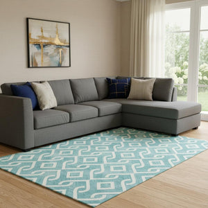 HomeRoots 9' X 12' Teal And Ivory Geometric Area Rug - Washable, UV-Protected, Stain-Resistant & Stylish! 652592