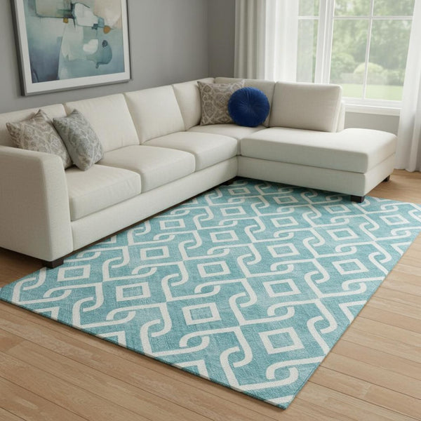 HomeRoots 10' X 14' Teal and Ivory Geometric Washable Area Rug - Durable, Stain-Resistant, UV Protected Decor! 652593