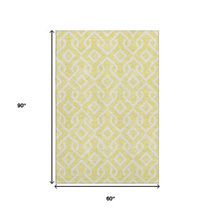 HomeRoots 5' X 8' Yellow and Ivory Geometric Area Rug - Durable, Washable, UV Protected for Family Homes 652601