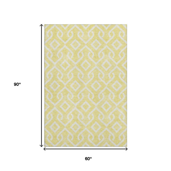 HomeRoots 5' X 8' Yellow and Ivory Geometric Area Rug - Durable, Washable, UV Protected for Family Homes 652601