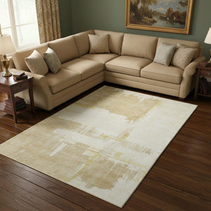 HomeRoots 10' X 14' Beige Ivory Gold Abstract Area Rug - Stylish, Washable, UV-Protected, Stain-Resistant Design 652677