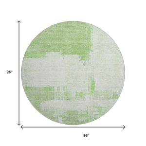 HomeRoots 8' Green and Ivory Abstract Round Rug - Washable, UV Protected, Durable for Homes with Kids & Pets 652692