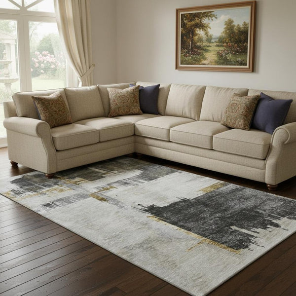 HomeRoots 8' X 10' Gray Gold Ivory Abstract Area Rug - Stylish, Washable, UV-Protected for High-Traffic Spaces 652699