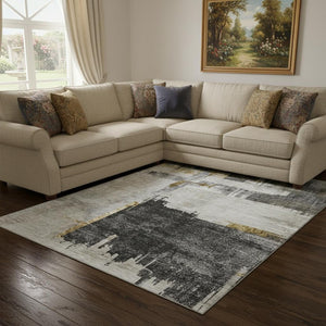 HomeRoots 10' X 14' Abstract Gray, Gold & Ivory Washable Area Rug with UV Protection for High-Traffic Spaces 652701