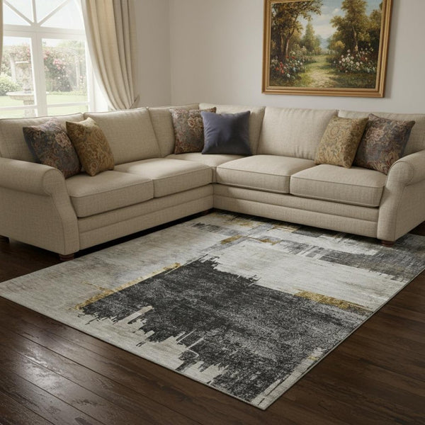 HomeRoots 10' X 14' Abstract Gray, Gold & Ivory Washable Area Rug with UV Protection for High-Traffic Spaces 652701