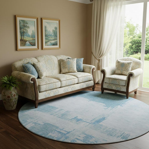 HomeRoots 8' Sky Blue and Ivory Abstract Round Rug - Washable, UV-Protected, Durable for Families & Pets 652704