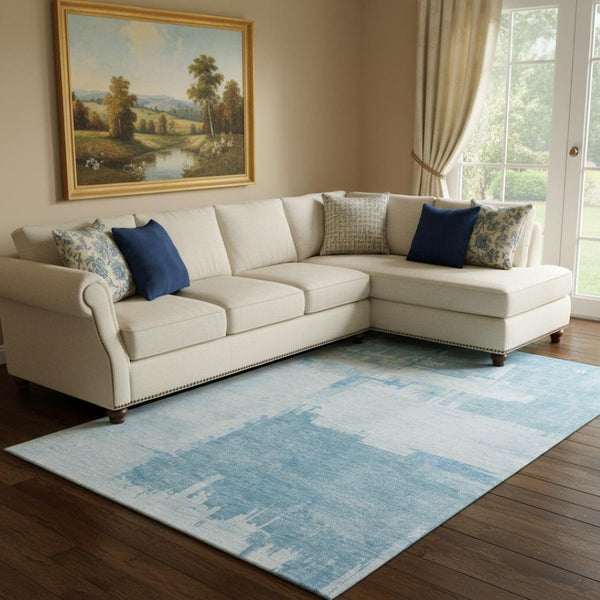 HomeRoots 9' X 12' Sky Blue and Ivory Abstract Area Rug - Washable, UV Protected, Soft & Stylish for Any Room 652706