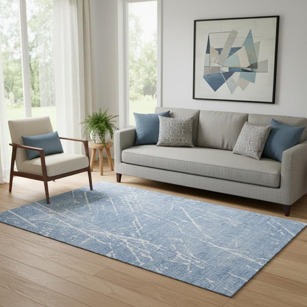 HomeRoots 5' x 8' Blue and Ivory Abstract Area Rug - Washable, Stain Resistant, UV Protected, Durable Elegance 652823