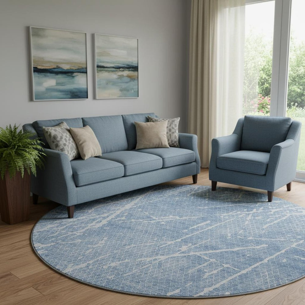 HomeRoots 8' Blue And Ivory Abstract Round Rug - Washable, UV Protected, Durable for High-Traffic Areas 652824