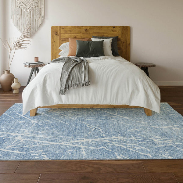 HomeRoots 8' X 10' Blue and Ivory Abstract Area Rug – Washable, UV Protected, Perfect for Kids and Pets! 652825