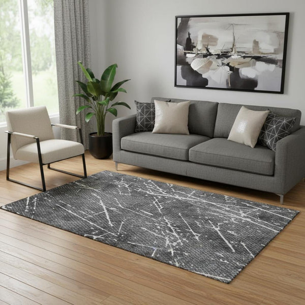 HomeRoots 5' X 8' Charcoal and Ivory Abstract Area Rug - Washable, UV-Protected, Family-Friendly Design! 652829